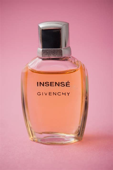 givenchy perfume pink background|Givenchy perfume pink bottle.